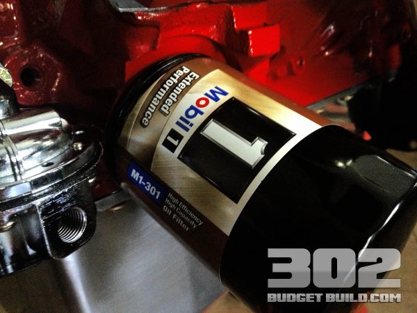 Install a new Mobil 1 oil filter or oil filter of your choice after the adapter is installed