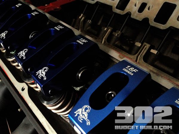Scorpion 1.6 ratio roller rockers installed on crane cams beehive springs with Ford Racing roller lifters, and channels. Pushrods by comp cams heat treated chromoly style.